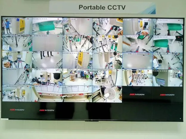 65-inch monitor showing all 28 cameras